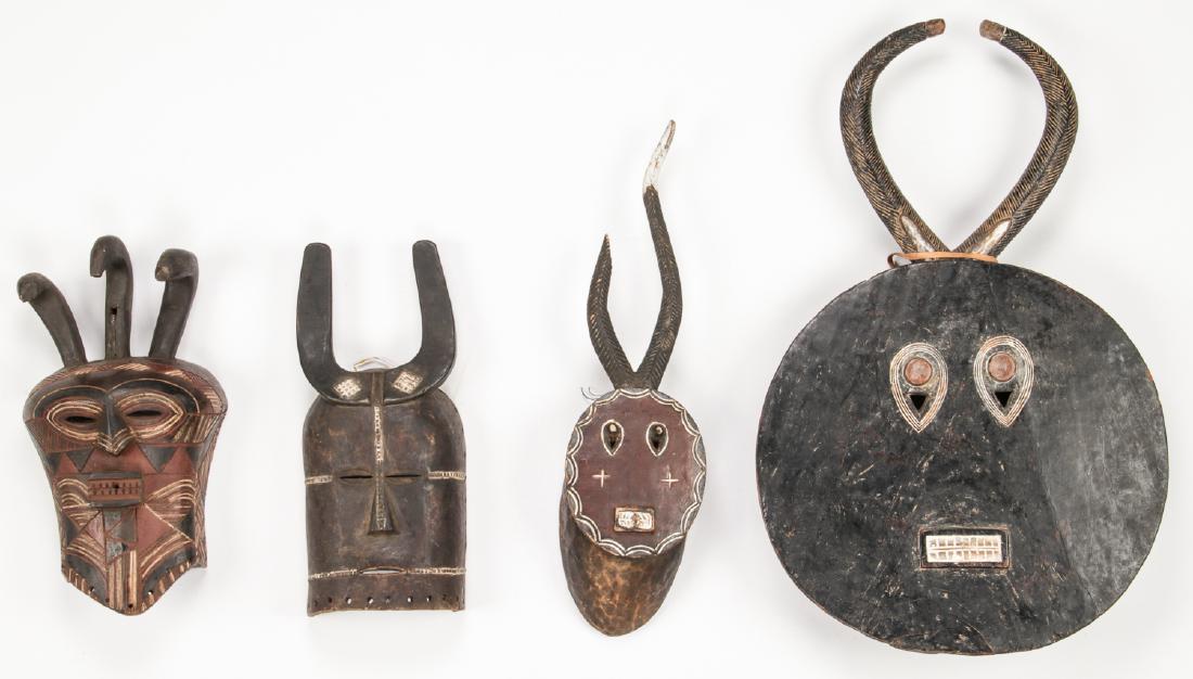 4 African Carved Wood Masks (1 of 2)