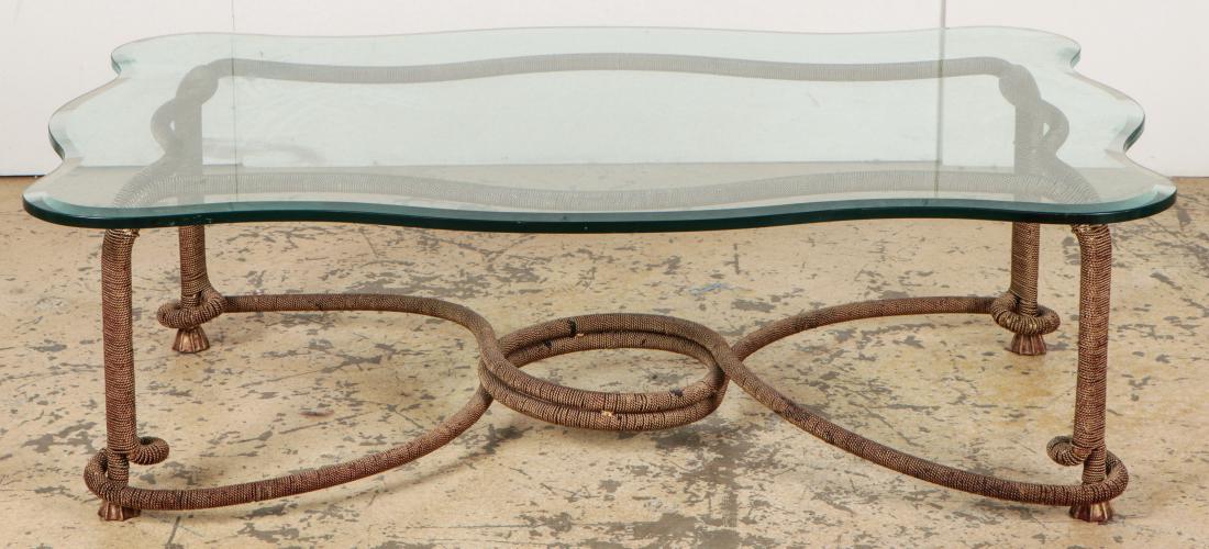 A Stark Ribbon Coffee Table with Glass Top: A Stark Ribbon Coffee Table with Glass Top. Size: 17.75'' x 57.25'' x 38.25'' (45 x 145 x 97 cm).