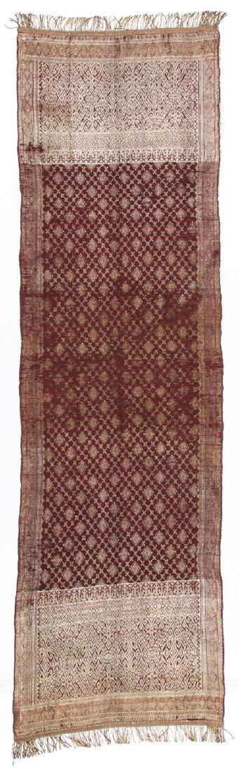 Pelambang Songket, Sumatra, Indonesia: Pelambang Songket, Sumatra, Indonesia. Silk with gold thread, natural dyes, late 19th/early 20th century. Size: 74'' x 22'' (188 x 56 cm). Prov: New England estate. International Textile Arts Auction,