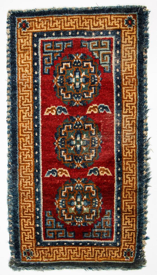 Tibetan Lama's 3 Medallion Sleeping Rug, Tibet, 19th C.: Tibetan Lama's 3 Medallion Sleeping Rug, Tibet, 19th C. Red field with gold border khaden, indicating ecclesiastical use. size: 2'6'' x 4'9'' (76 x 145 cm). Provenance: Bill Liske. International Texti
