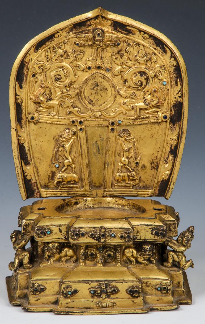 Antique Sino-Tibetan Gilt Bronze Throne Stand: Antique Sino-Tibetan Gilt Bronze Throne Stand. Size: 7.5'' x 5'' x 3.5'' (19 x 13 x 9 cm).