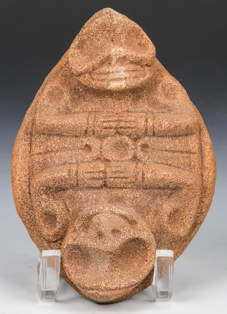 Taino Two-Headed Cemi/Stamp (c. 1000-1500 AD): Taino Two-Headed Cemi/Stamp (c. 1000-1500 AD), with frog forehead double imagery. Cover mouth and second frog appears on either head. Base is complex system of quadrants. These were probably not used