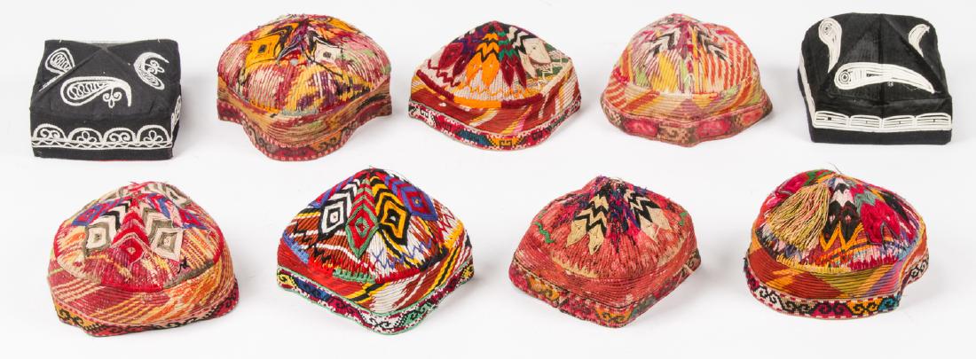 Collection of 9 Central Asian Hats: Collection of 9 Central Asian Hats. Largest size: 4'' x 7'' x 7'' (10 x 18 x 18 cm).