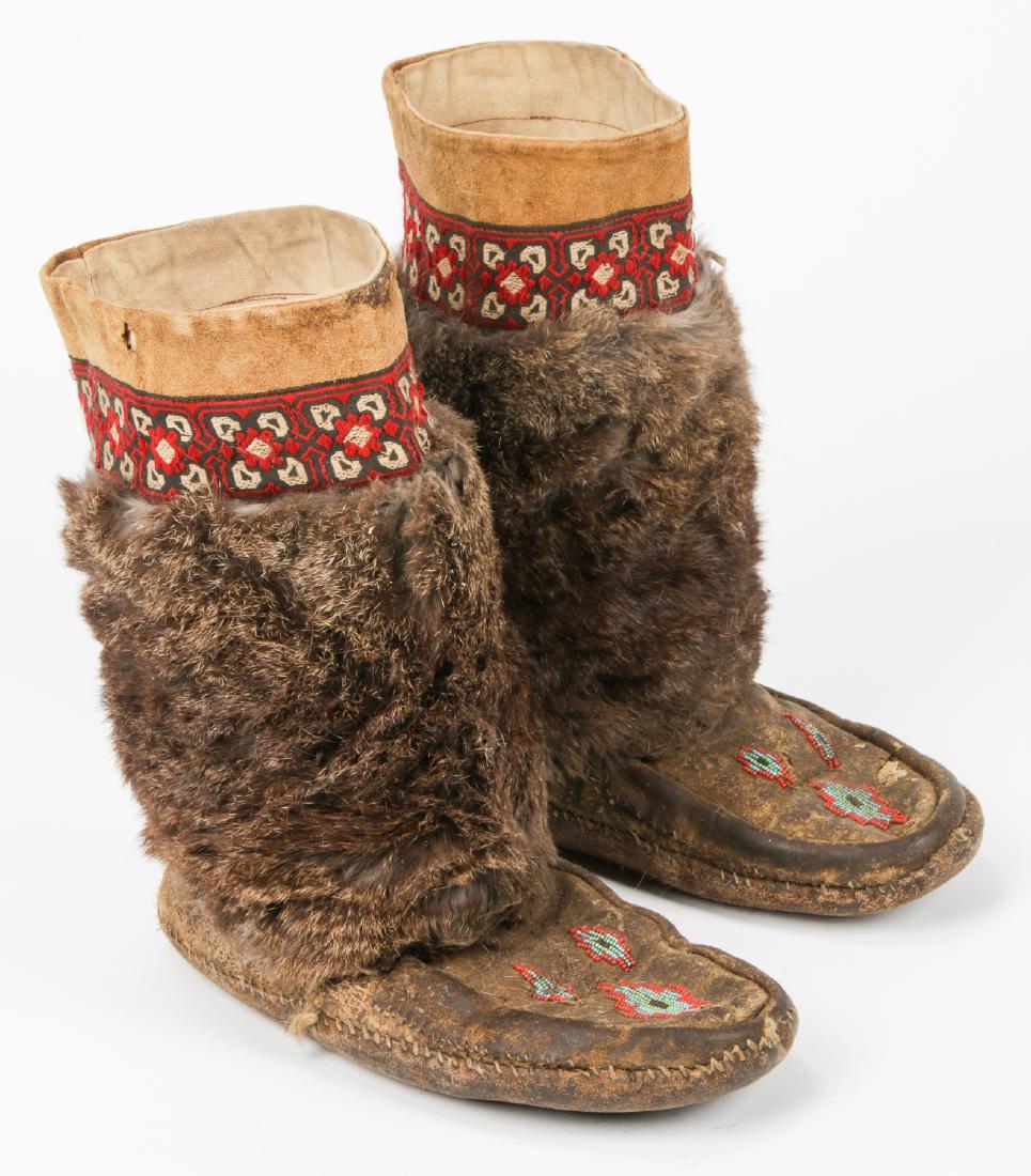 Pair of Old Inuit Beaded Mukluks/Boots: Pair of Old Inuit Beaded Mukluks/Boots. Each size: 11'' x 5'' x 12'' (28 x 13 x 30 cm).