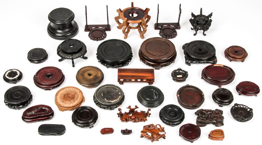 Large Estate Collection of Chinese Display Bases: Large Estate Collection of Chinese Display Bases. Ranging in size from: 1'' x 2.25'' x 1.5'' (3 x 6 x 4 cm) to 5'' x 7'' x 7'' (13 x 18 x 18 cm).
