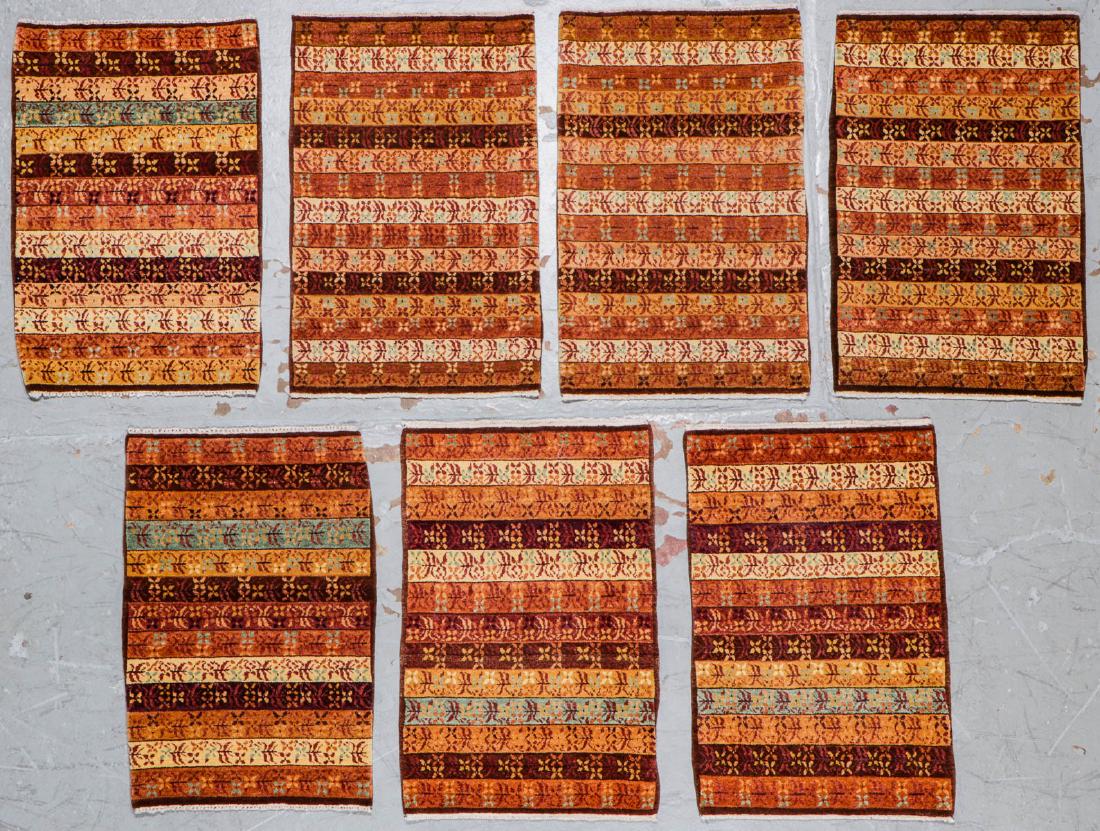 7 Small Khotan Rugs (1 of 3)