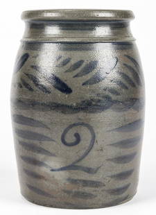 2 GALLON STONEWARE JAR: 2 GALLON STONEWARE JAR. With gray leaf pattern motif; salt glaze.Size: 11.5''H x 8''Diameter (29 x 20 cm).