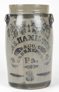 3 GALLON JAS. HAMILTON & CO, GREENSBORO PA, STONEWARE: 3 GALLON JAS. HAMILTON & CO, GREENSBORO PA, STONEWARE JAR.With gray leaf and stencil type motif; salt glaze. Size: 14'' x 8.25'' x 8'' (36 x 21 x 20 cm).