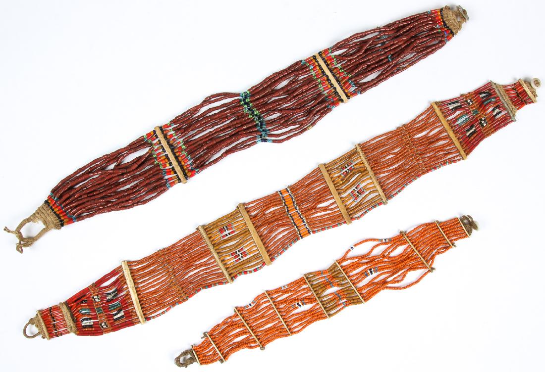 2 Antique Konyak Naga Belts & 1 Choker: 2 Antique Konyak Naga Belts & 1 Choker - antique glass trade bead children's belts and short choker historically worn by Konyak Nagas - 19" (48 cm) brown and 21" (53 cm) mustard orange belts and 12" (