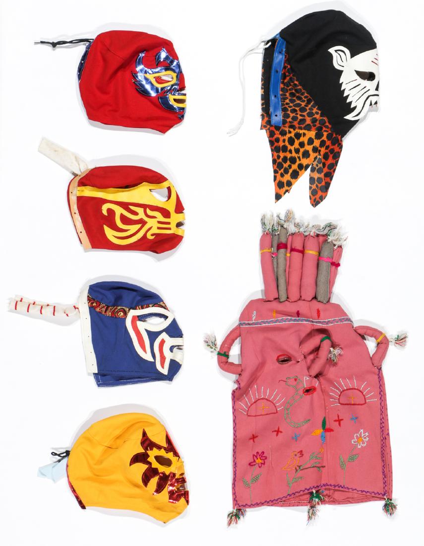 5 Mexican Wrestling Masks and a vintage Colombian: 5 Mexican Wrestling Masks and a vintage Colombian Marimonda Mask. Ranging in from size: 22'' x 15'' (56 x 38 cm) to 10'' x 9'' (25 x 23 cm).