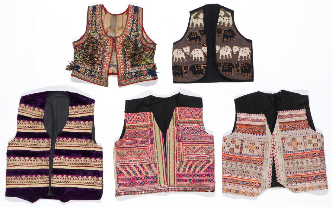 5 Vintage Ethnographic Textile Vests: 5 Vintage Ethnographic Textile Vests, one finely embroidered and decorated with coral-like beads and gold/silver threads. Ranging in size from 23'' x 21'' (58 x 53 cm) to 19'' x 18'' (48 x 46 cm).