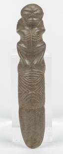 Taino Anthropo-zoomorphic Vomit Stick (1000-1500 CE): Taino Anthropo-zoomorphic Vomit Stick (1000-1500 CE). Grey basalt like stone. Used to purge prior to taking the hallucinogen cohoba. Full figure with reversed head. Quadrant symbol beneath Figure.