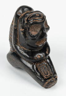 Taino Stone Carving (1000-1500 CE): Taino Stone Carving (1000-1500 CE). Heavy iron rich stone with slight magnetic field. Free standing. Provenance: Larry Roberts, author of Taino Sculpture: Art of the Gods. Size: 3'' x 1'' x 2.75'' (8