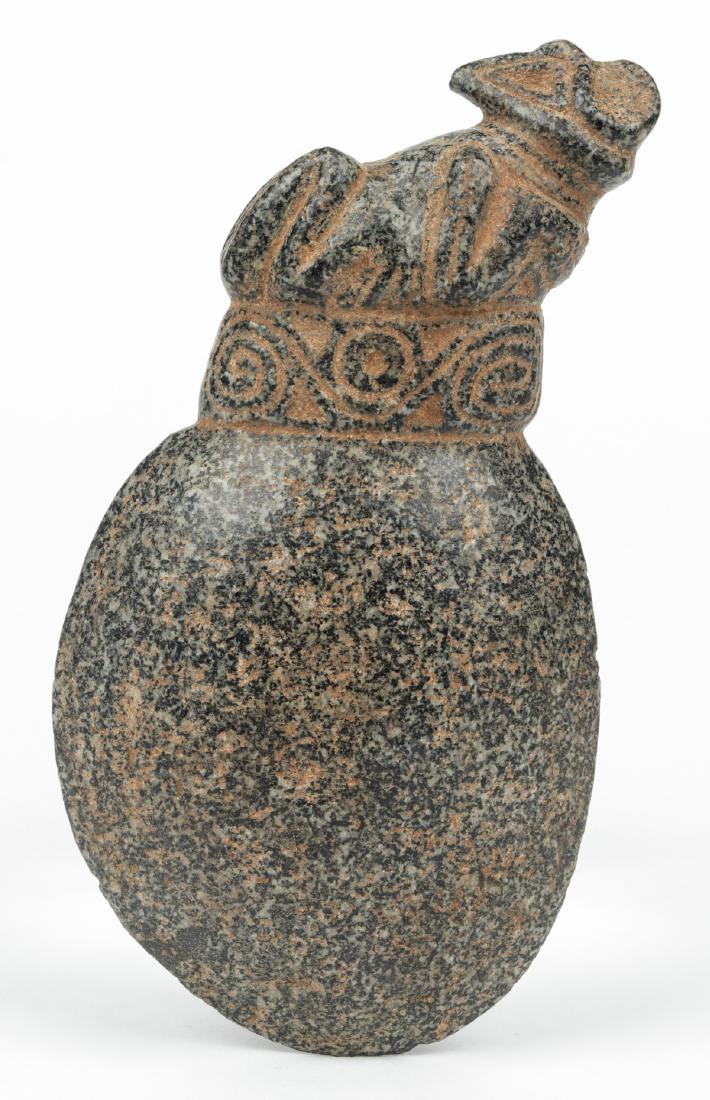 Taino Heavy Granite Ax (1000-1500 CE): Taino Heavy Granite Ax (1000-1500 CE) with reclining bird man at top. Inter locking bird head symbols in band surround. Provenance: Larry Roberts, author of Taino Sculpture: Art of the Gods. Size: 7.5