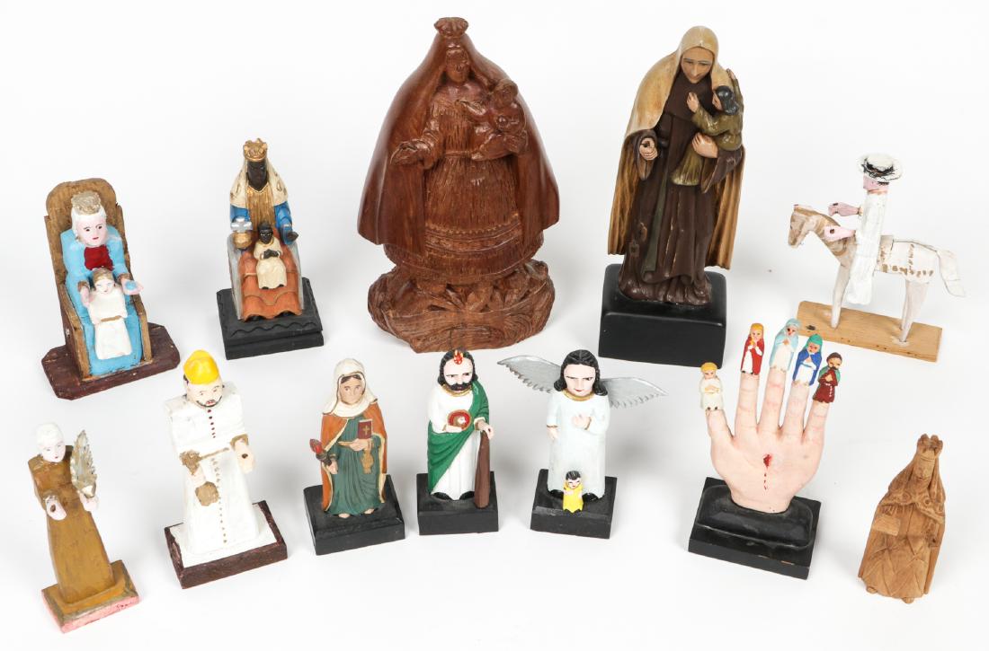 (12) Carved Wood Santos Figures by Various Artists: (12) Carved Wood Santos Figures by Various Artists including: Roberto Rivera (PR), Carmelo Soto (PR), Froilan (Cuba), Louis G. (PR). Largest Size: 13'' x 7.5'' x 2.5'' (33 x 19 x 6 cm). Provenance: Ri