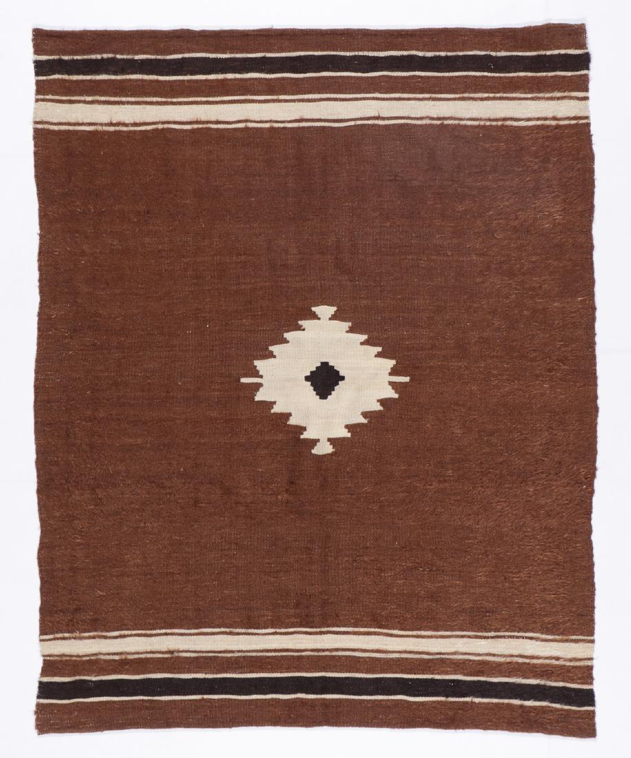 Vintage Tulu Rug, Turkey: 4'4'' x 5'5'': Vintage Tulu Rug, Turkey: 4'4'' x 5'5'' (132 x 165 cm). 5 lbs. Note on terms for estimating the age of an item: Antique (100+ years). Semi-Antique (50-100 years). Vintage (20-50 years). Modern (up to 