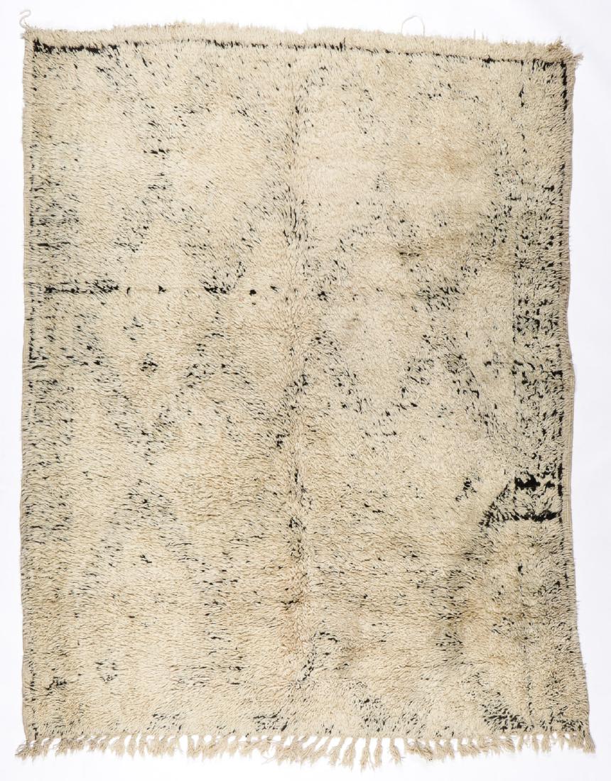 Vintage Wool Moroccan Pile Rug: 6'9'' x 8'8'': Vintage Wool Moroccan Pile Rug: 6'9'' x 8'8'' (206 x 264 cm). 32 lbs. Note on terms for estimating the age of an item: Antique (100+ years). Semi-Antique (50-100 years). Vintage (20-50 years). Modern 