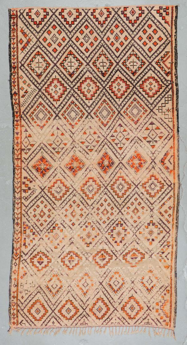 Vintage Wool Moroccan Pile Rug: 5'9'' x 11'0'': Vintage Wool Moroccan Pile Rug: 5'9'' x 11'0'' (175 x 335 cm). 18 lbs. Note on terms for estimating the age of an item: Antique (100+ years). Semi-Antique (50-100 years). Vintage (20-50 years). Modern