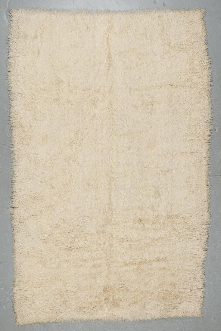 Modern Tulu Rug, Turkey: 6'9'' x 10'10": Modern Tulu Rug, Turkey: 6'9'' x 10'10'' (206 x 330 cm). 18 lbs. Note on terms for estimating the age of an item: Antique (100+ years). Semi-Antique (50-100 years). Vintage (20-50 years). Modern (up t