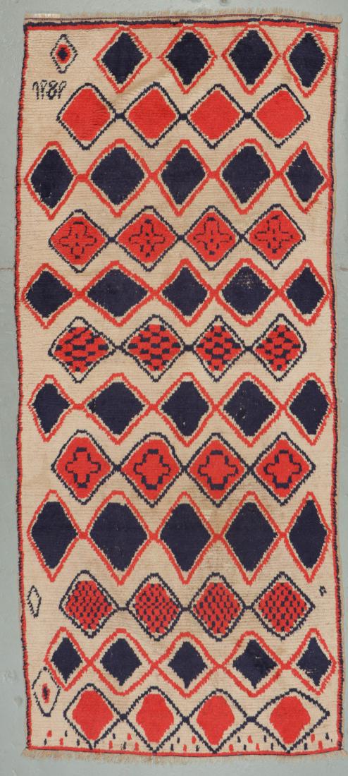 Vintage Moroccan Wool Pile Rug: 4'3'' x 10'1'': Vintage Moroccan Wool Pile Rug: 4'3'' x 10'1'' (130 x 307 cm). 10 lbs. Dated "1989". Note on terms for estimating the age of an item: Antique (100+ years). Semi-Antique (50-100 years). Vintage (20-50 