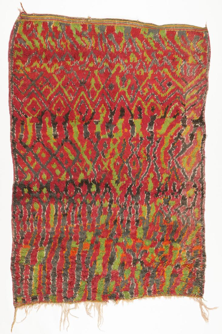 Vintage Moroccan Wool Pile Rug: 5'10'' x 8'6'': Vintage Moroccan Wool Pile Rug: 5'10'' x 8'6'' (178 x 259 cm). 18 lbs. Note on terms for estimating the age of an item: Antique (100+ years). Semi-Antique (50-100 years). Vintage (20-50 years). Modern