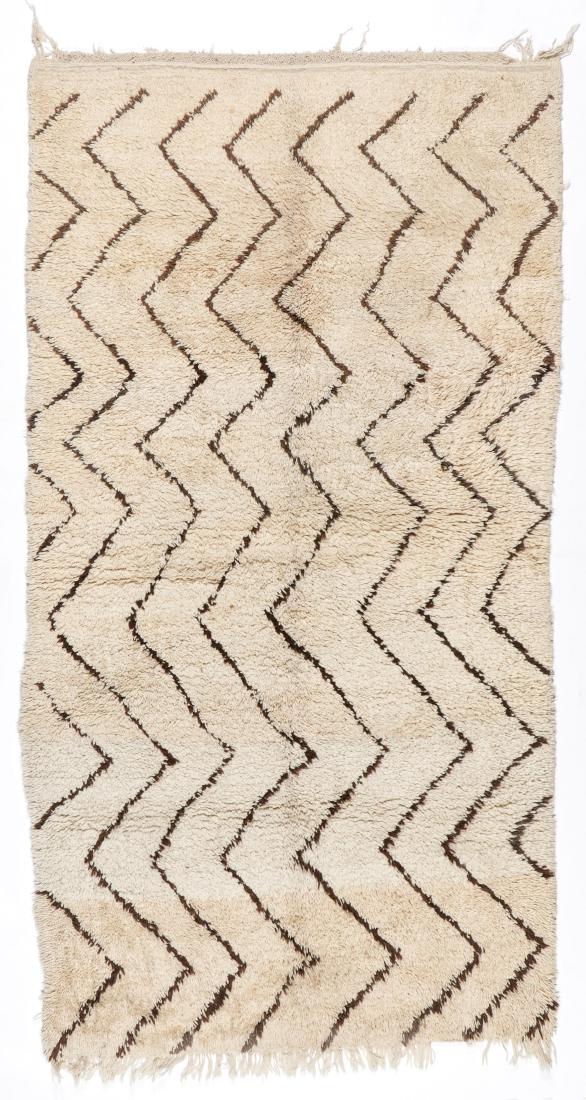 Vintage Wool Moroccan Pile Rug: 5'0'' x 9'4'': Vintage Wool Moroccan Pile Rug: 5'0'' x 9'4'' (152 x 284 cm). 29 lbs. Note on terms for estimating the age of an item: Antique (100+ years). Semi-Antique (50-100 years). Vintage (20-50 years). Modern 