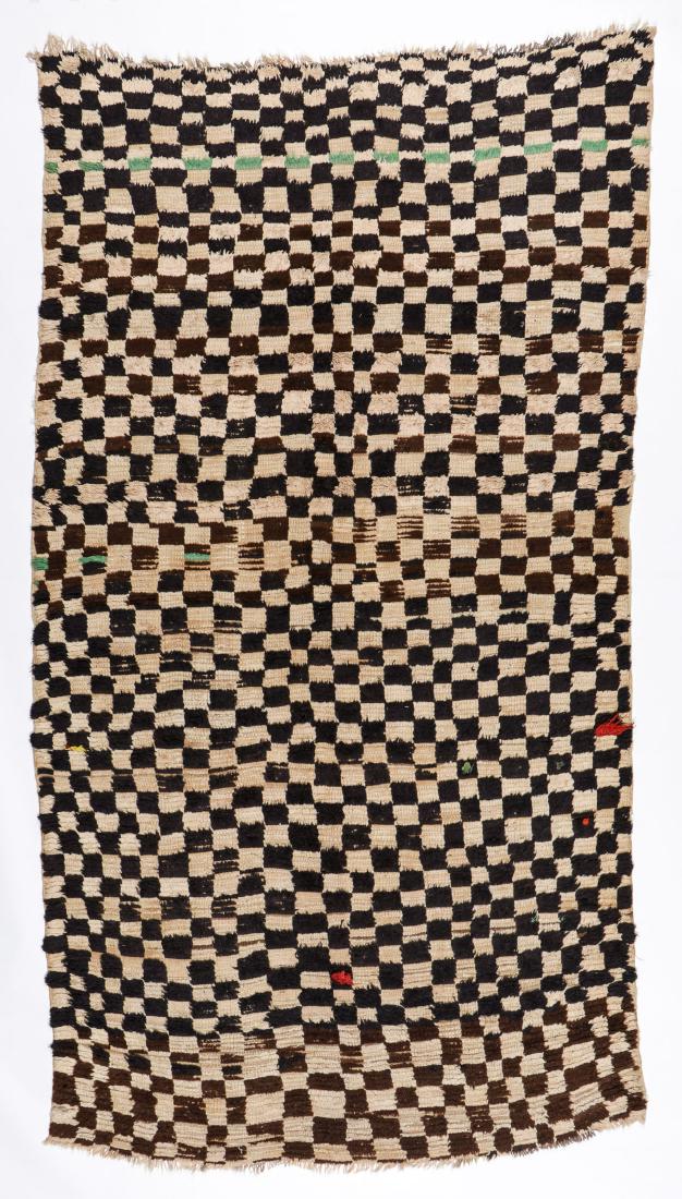 Vintage Wool Moroccan Pile Rug: 5'5'' x 9'11'': Vintage Wool Moroccan Pile Rug: 5'5'' x 9'11'' (165 x 302 cm). 17 lbs. Note on terms for estimating the age of an item: Antique (100+ years). Semi-Antique (50-100 years). Vintage (20-50 years). Modern