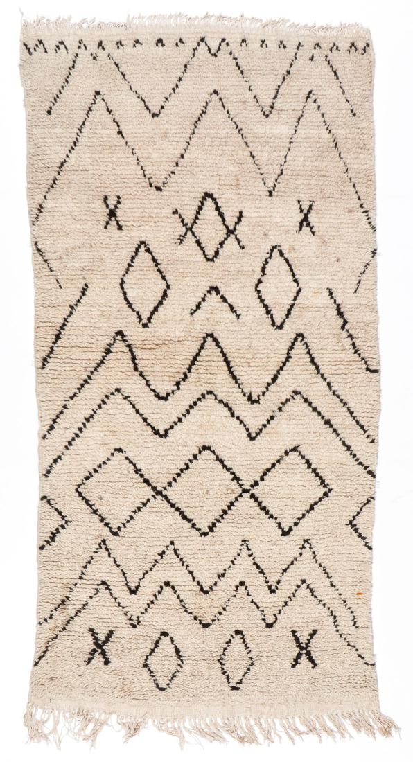 Vintage Wool Moroccan Pile Rug: 3'3'' x 6'7'': Vintage Wool Moroccan Pile Rug: 3'3'' x 6'7'' (99 x 201 cm). 7 lbs. Note on terms for estimating the age of an item: Antique (100+ years). Semi-Antique (50-100 years). Vintage (20-50 years). Modern (u