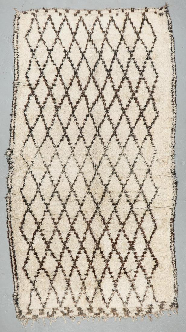 Vintage Beni Ourain Rug, Morocco: 6'11'' x 12'10'': Vintage Beni Ourain Rug, Morocco: 6'11'' x 12'10'' (211 x 391 cm). 50 lbs. Note on terms for estimating the age of an item: Antique (100+ years). Semi-Antique (50-100 years). Vintage (20-50 years). Mo