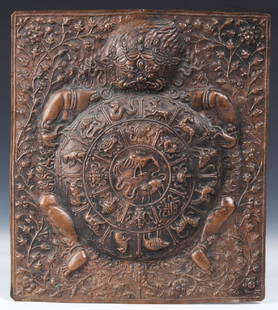 Antique Newari Copper Repousse Wheel of Life: Antique Newari Copper Repousse Wheel of Life(Sanskrit: Bhavacakra) wall plaque with Yama, the wrathful Monster of Impermanence, clasping the cosmos to illustrate the temporary nature of all