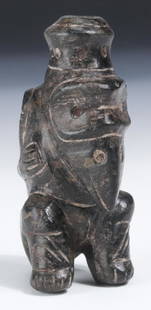 Taino Rare Sitting Shamanic Human to Bird Cohoba: Taino Rare Sitting Shamanic Human to Bird Cohoba Inhaler (1000-1500 CE). Made of a basalt-like stone. Additional bird head carved on beak. Size: 3'' x 1.5'' x 1.5'' (8 x 4 x 4 cm). Provenance: Larry