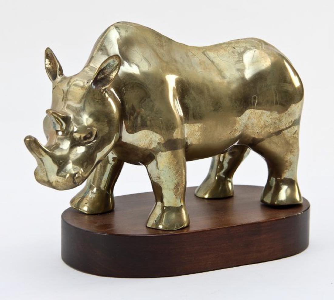 Frederick Cooper Brass Rhino Sculpture: Brass Rhino Sculpture by Frederick Cooper, Chicago. Provenance: Ex. GlaxoSmithKline Collection. Size: 8.5'' x 12'' x 5.75'' (22 x 30 x 15 cm).