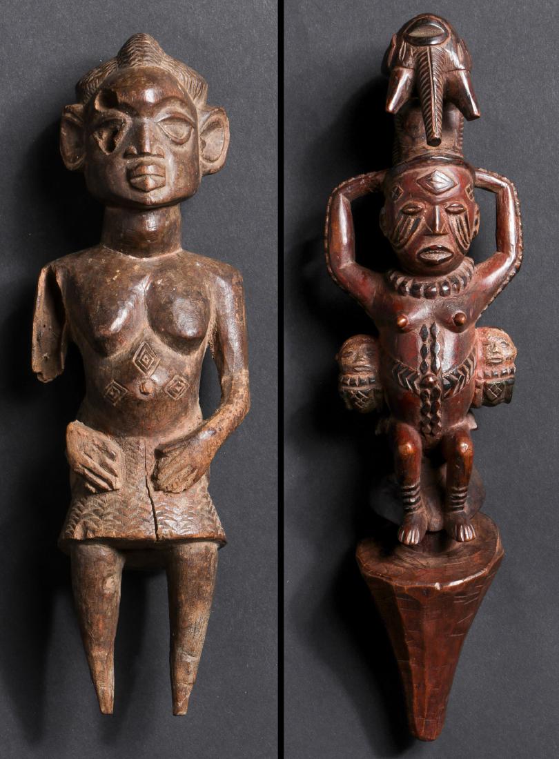 Two African Statues: Two African Statues. 1) Carved Wood Luba Statue, Zaire. Size: 10.25'' x 3.25'' x 2.75'' (26 x 8 x 7 cm). 2) Carved Wood Kuyu Figure, Zaire. Size: 13'' x 3.5'' x 3.5'' (33 x 9 x 9 cm).