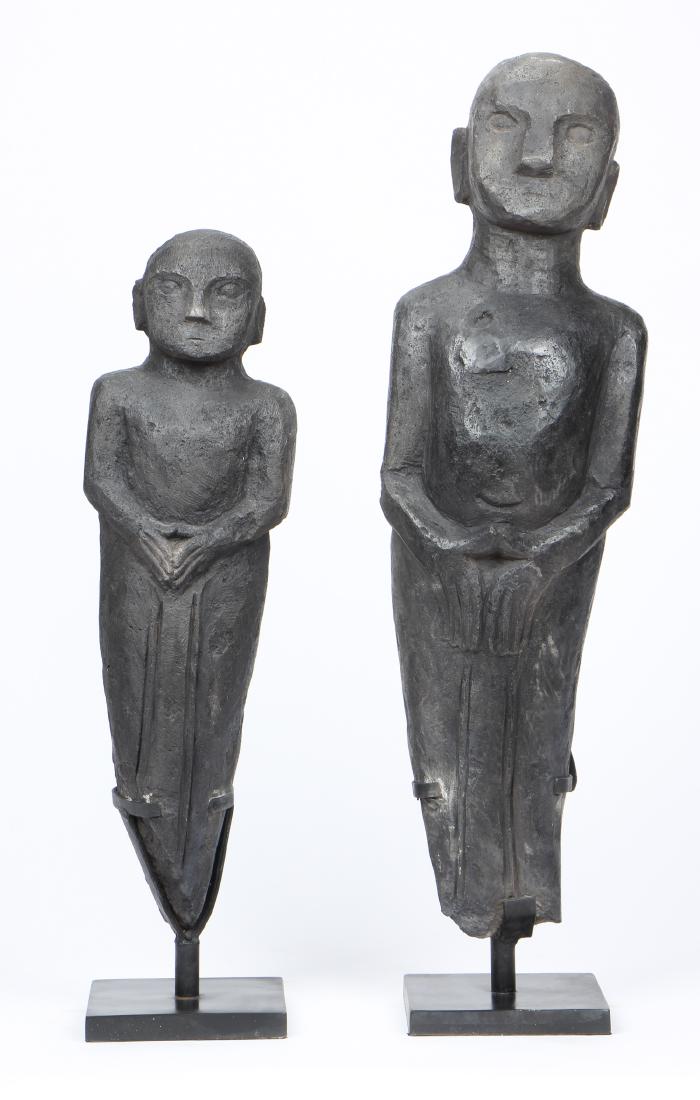 Two Indonesian Carved Wood Tribal Statues: Two Indonesian Carved Wood Tribal Statues. Ranging in size from: 27.75'' x 7.75'' x 5.25'' (70 x 20 x 13 cm), height on stand: 31.25" (79 cm) to 36'' x 10'' x 6'' (91 x 25 x 15 cm), height on stand: 3