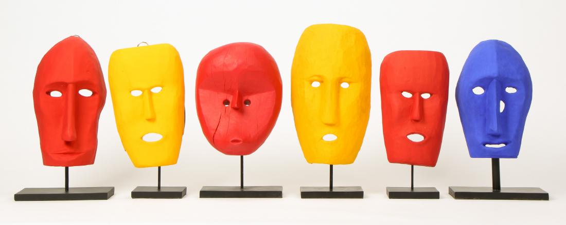 6 Brightly Painted Indonesian Tribal Masks: 6 Brightly Painted Indonesian Tribal Masks. Largest object: 13.5'' x 8'' x 5'' (34 x 20 x 13 cm). Height on stand: 17" (43 cm).