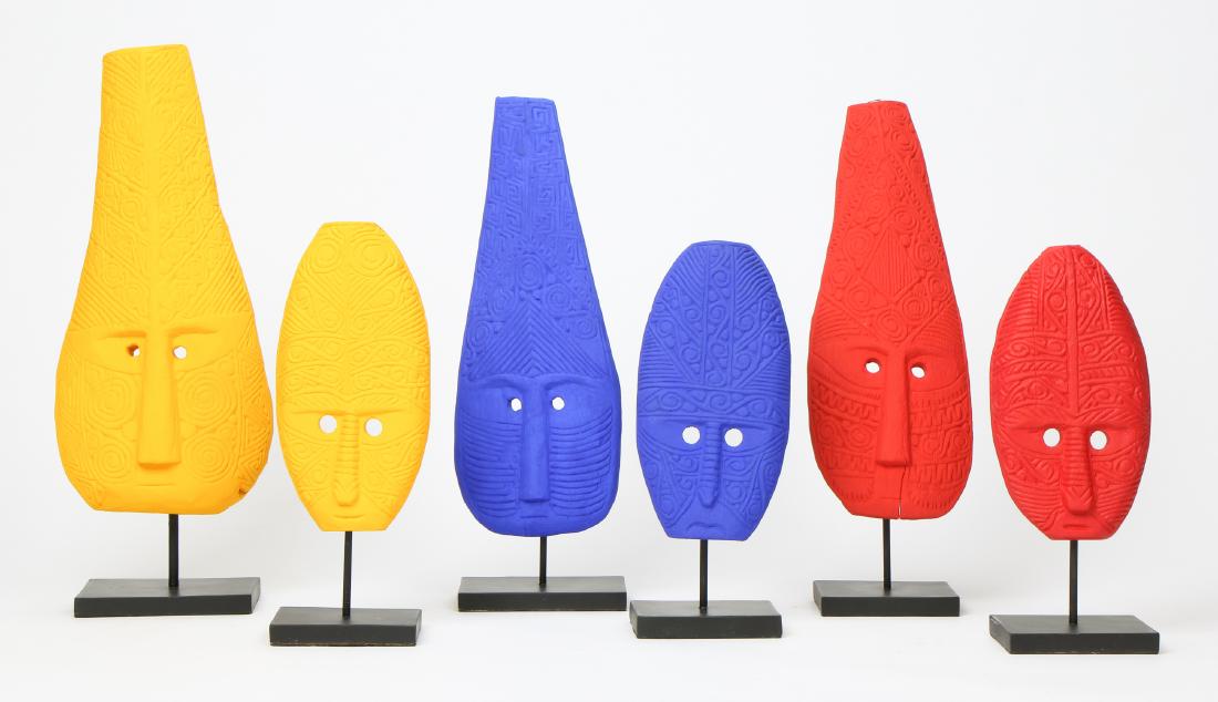 6 Brightly Painted Indonesian Tribal Masks: 6 Brightly Painted Indonesian Tribal Masks. Ranging in size from: 9.75'' x 5.25'' x 1'' (25 x 13 x 3 cm), height on stand: 13" (33 cm) to 16.5'' x 7.5'' x 2.75'' (42 x 19 x 7 cm), height on stand: 20"