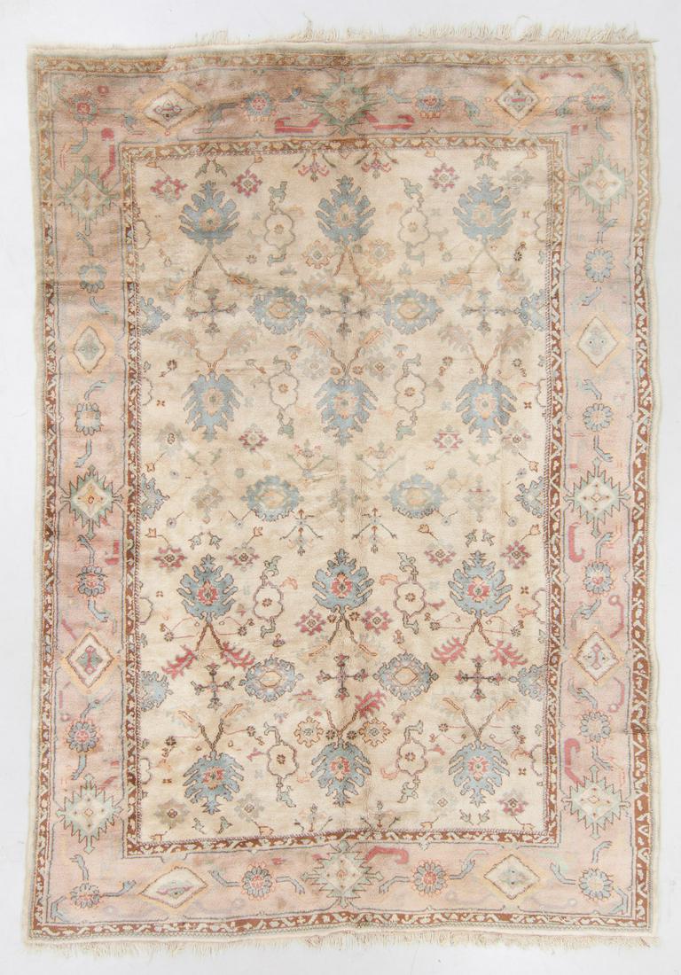 Vintage Oushak Rug, Turkey: 10'3'' x 14'4'': Vintage Oushak Rug, Turkey: 10'3'' x 14'4'' (312 x 437 cm). 122 lbs. Villanova PA estate. Note on terms for estimating the age of an item: Antique (100+ years). Semi-Antique (50-100 years). Vintage (2