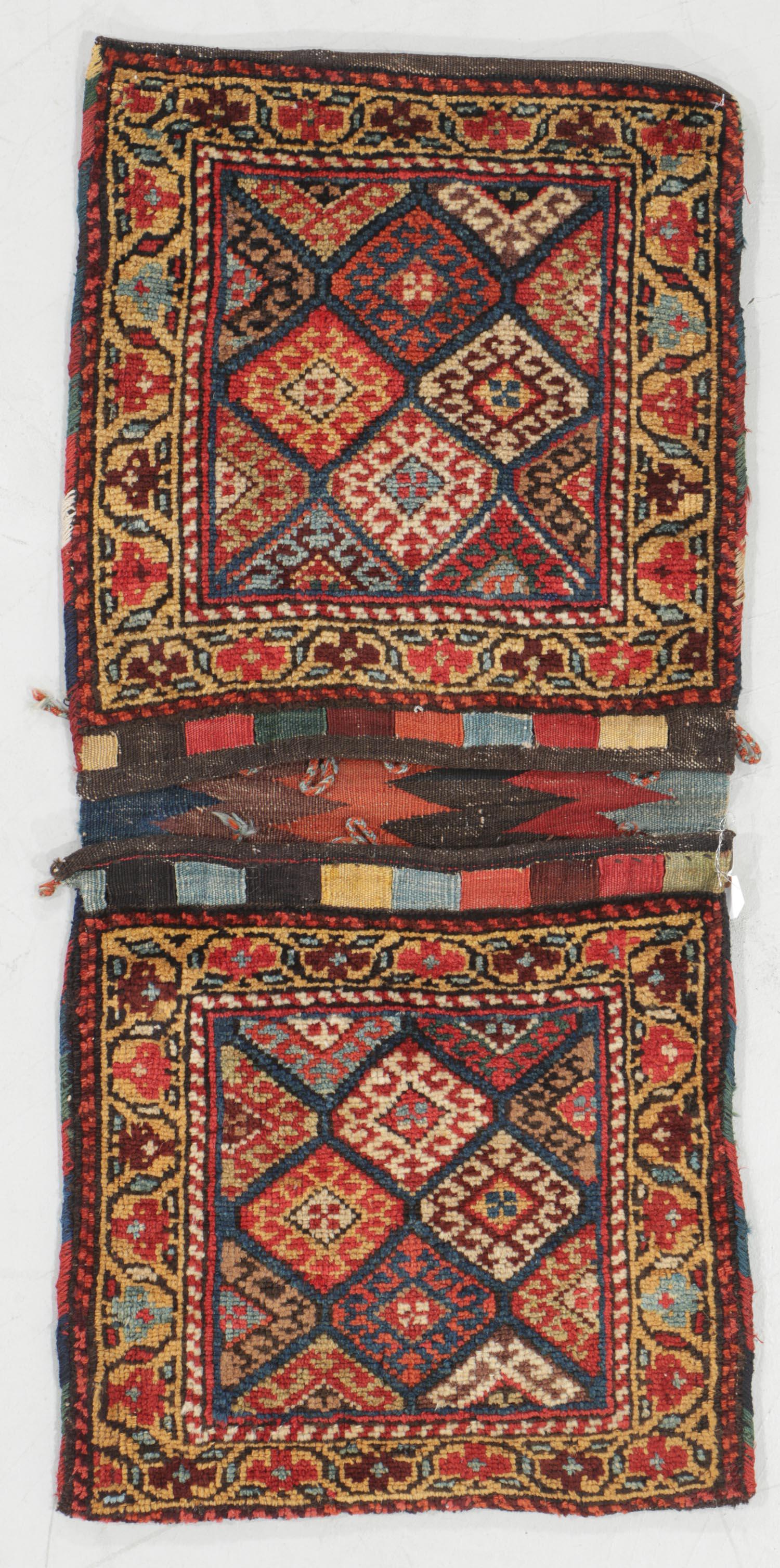 Antique NW Persian Kurdish Pile Khorjin: Kurdish Pile Khorjin, circa 1900, wool, natural dyes: 42'' x 20'' (107 x 51 cm). 4 lbs. Provenance: Eric Jacobson collection.