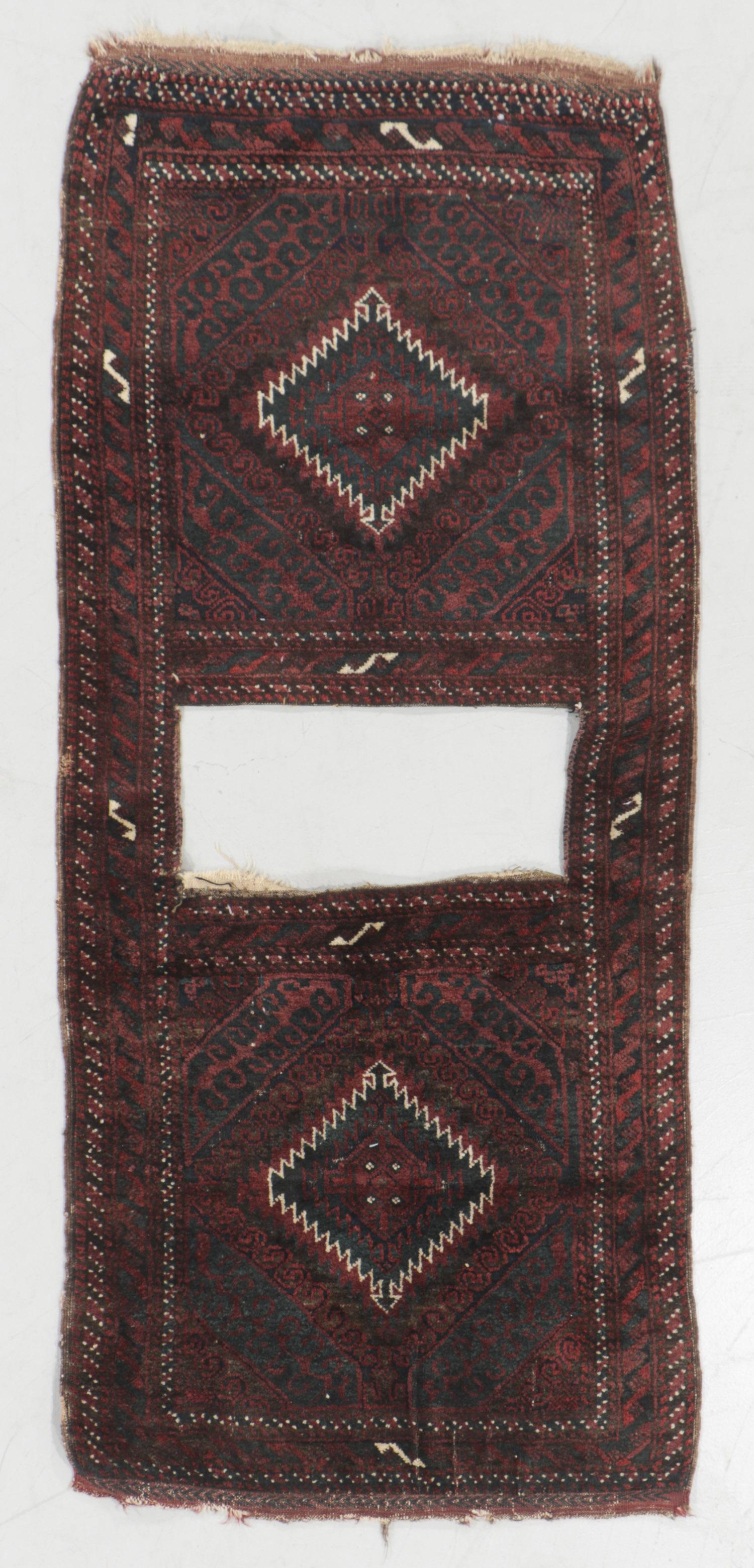Antique Beluch Saddle Trapping, Afghanistan: Antique Beluch Saddle Trapping, Afghanistan: 2'5'' x 5'6'' (74 x 168 cm). 5 lbs. Please note: No Reserve on this lot or any other lot in this auction. All acceptable bidding commences at the Online St