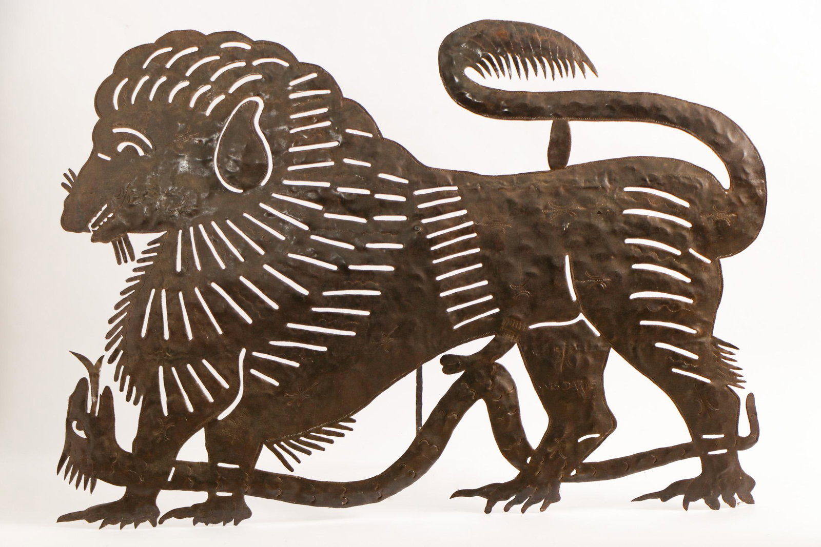 Yves Darius (Haitian, 20th Century) Steel Drum Cutout: Yves Darius (Haitian, 20th Century) Cut-Out Lion with Snake, signed. Size: 34'' x 48.5'' x 14'' (86 x 123 x 36 cm).