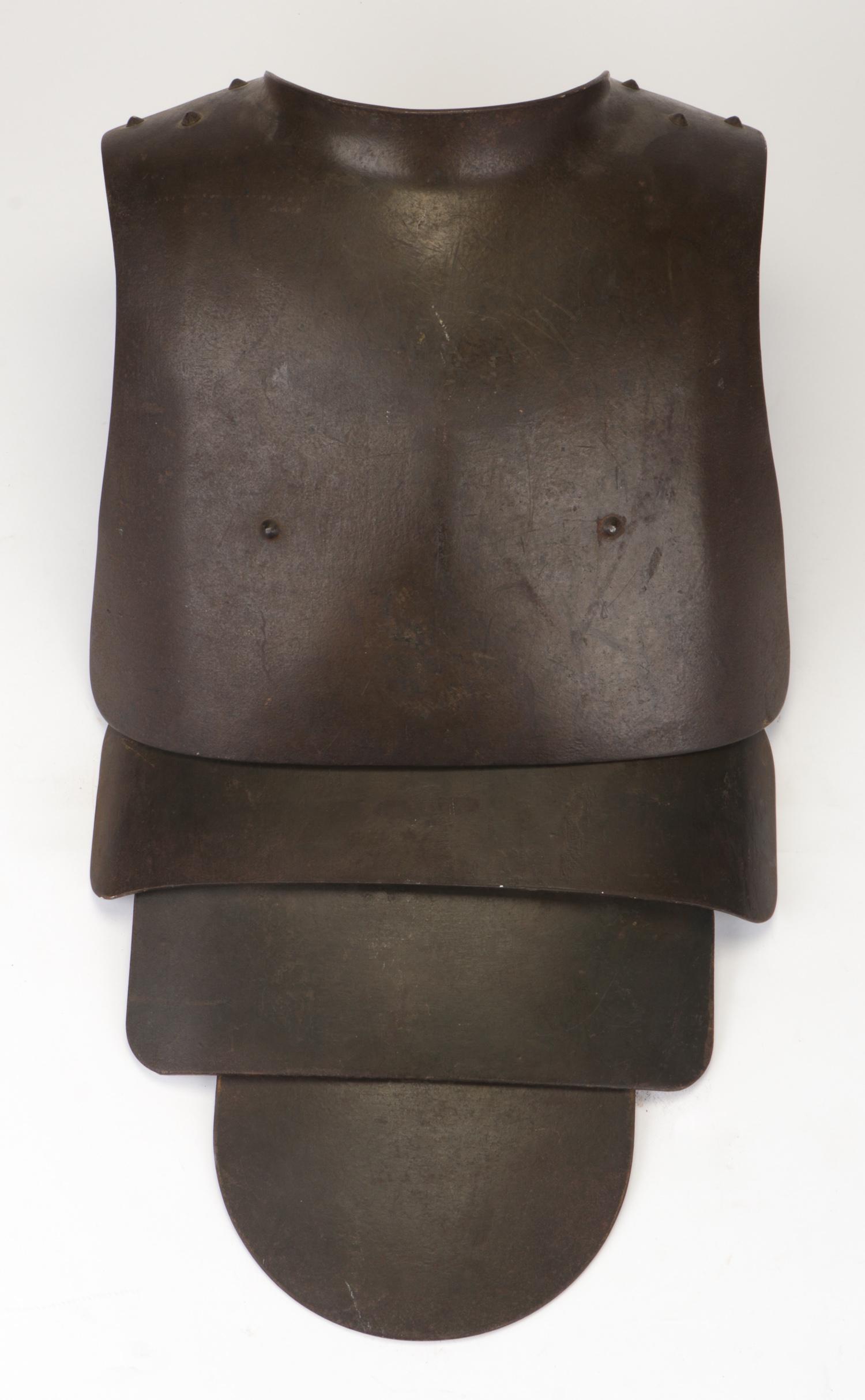 German WWI Machine Gunner's Steel Body Armor: German WWI Machine Gunner's Steel Body Armor. Comprised of four curved steel plates (one detached) on leather straps. Provenance: Collection of Allan Stone, New York. Size: 30" x 14" x 10" (76 x 36 x 