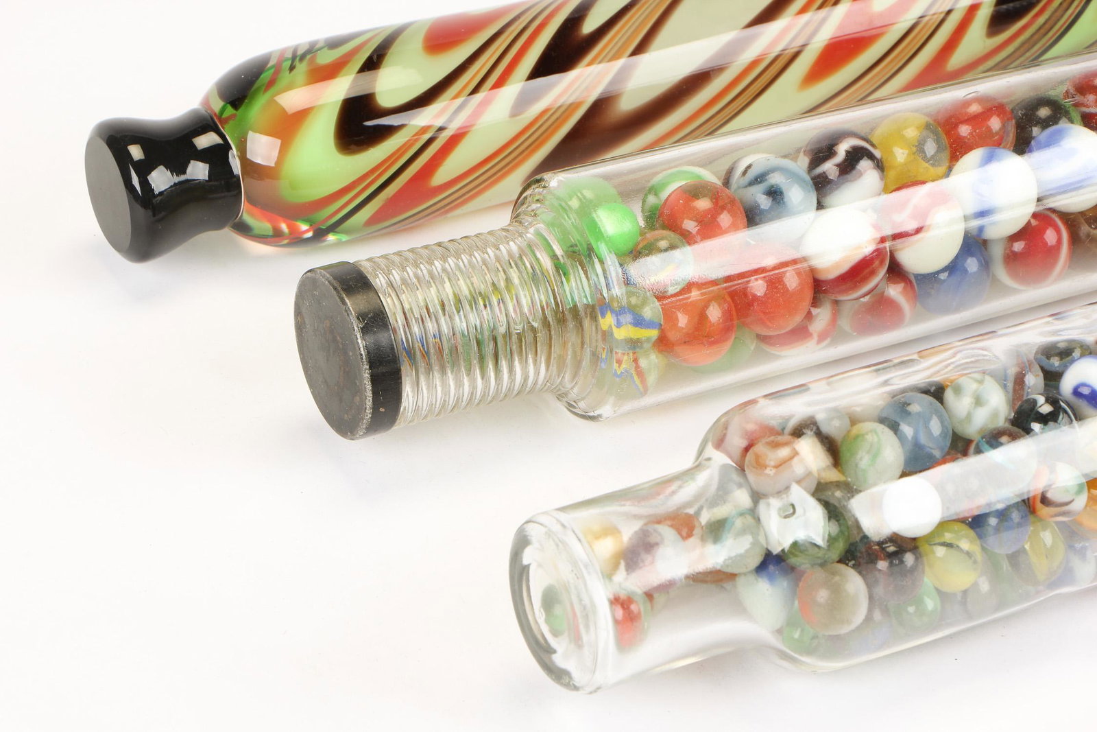 Three Glass Rolling Pins: Three Glass Rolling Pins. Ranging in size from: 15.75'' x 2.5'' (40 x 6 cm) to 14.25'' x 3'' (36 x 8 cm).