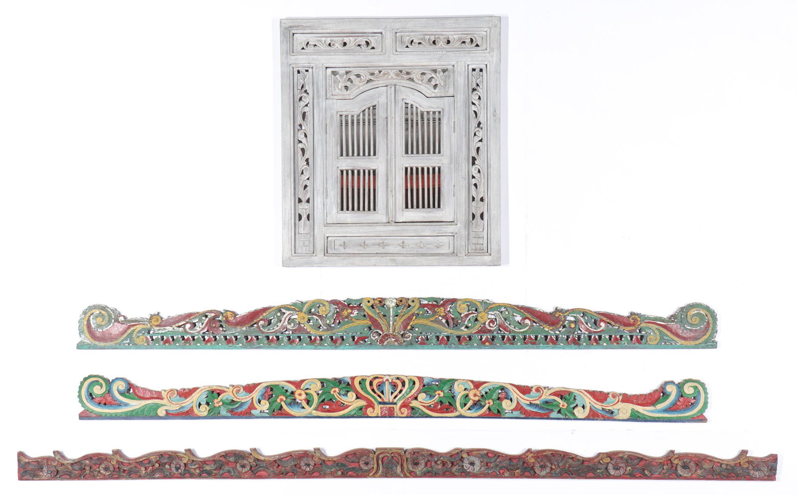 3 Old Indonesian Carved Wood Arch. Lintels & Teak: 3 Old Indonesian Carved Wood Arch. Lintels and a Teak Window, early 20th c. Ranging in size from: 4.5'' x 108'' x 1'' (11 x 274 x 3 cm) to 35.5'' x 31.5'' x 1'' (90 x 80 x 3 cm).