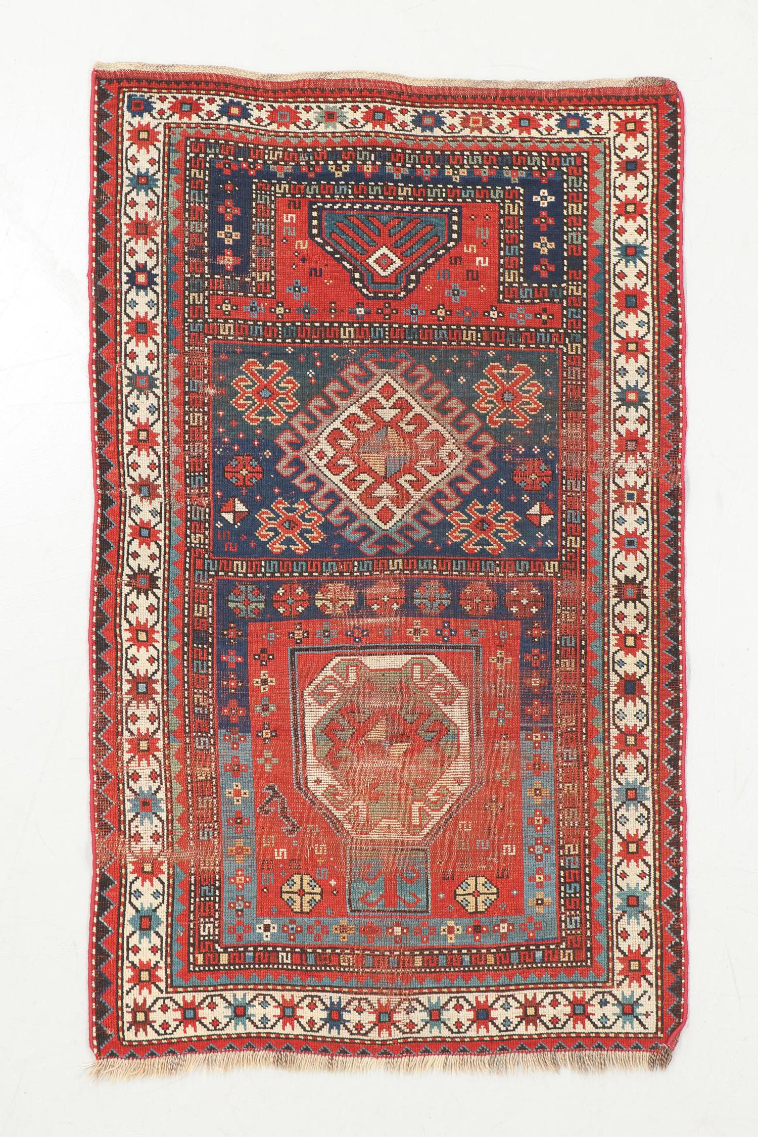 Antique Kazak Prayer Rug, Caucasus: Antique Kazak Prayer Rug, Caucasus, wool, late 19th c. Size: 3'3'' x 5'6'' (99 x 168 cm). 5 lbs. Warp: wool, weft: wool, pile: wool.