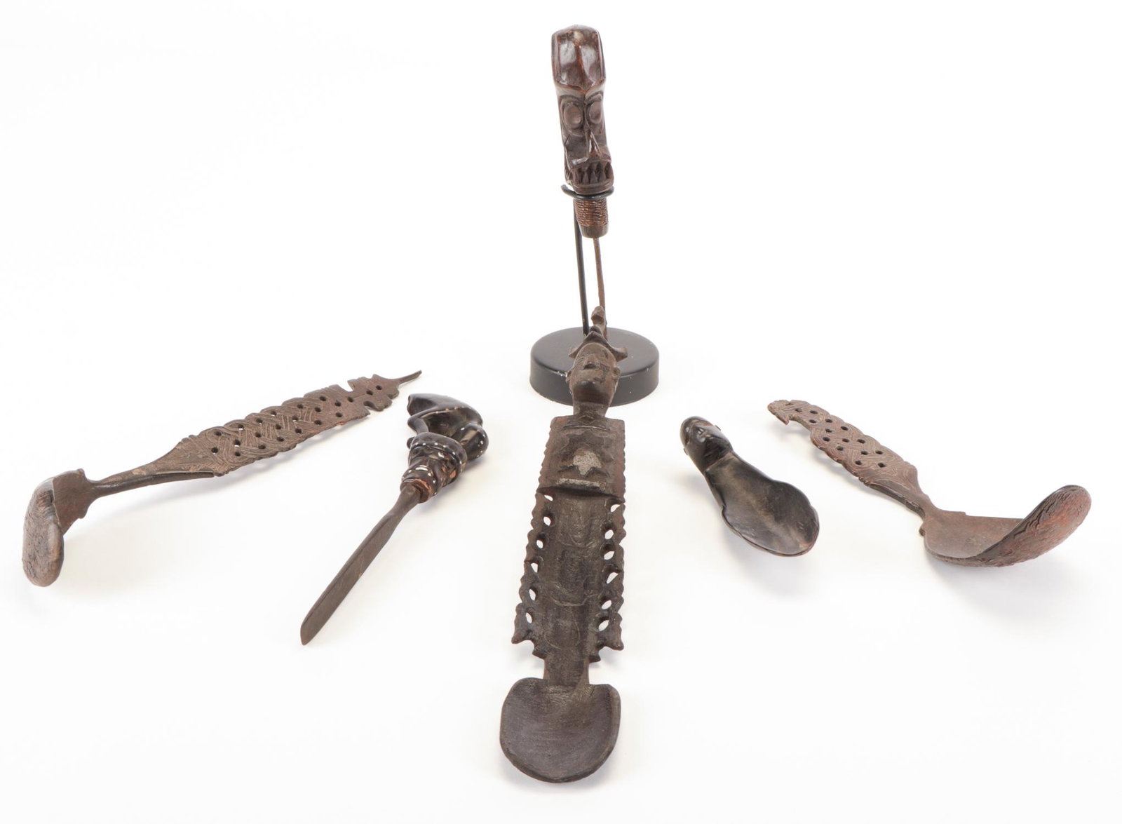 Group of 6 Ethnographic Carvings: Group of 6 Ethnographic Carvings, including carved horn spoons, West Timor; and a lime pestle in the form of a bird for betelnut use; horn inlaid with metal, Lombok. Range in Size from: 1'' x 4'' x 1.
