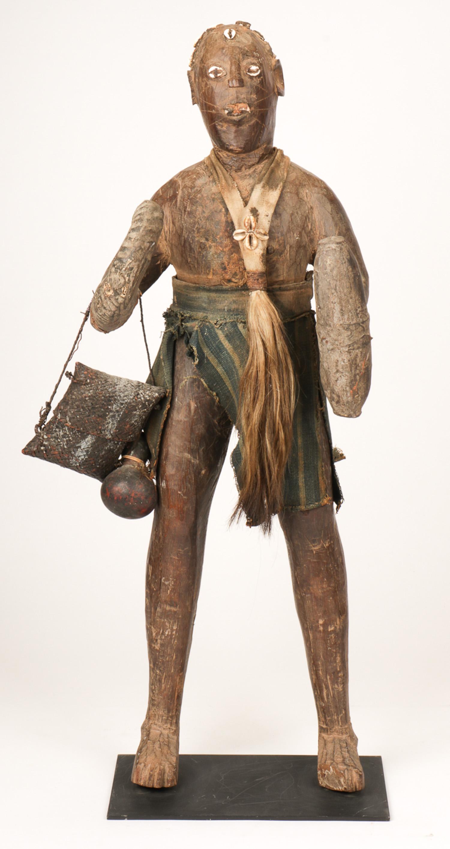 Large African Power Figure, Nigeria, 39" Ht.: Large African Power Figure, Nigeria. Carved wood, ram's horn, cowrie shell, gourd, plant fiber, cloth. Collection of Allan Stone, New York. Size: 39" x 19.5" x 12.5" (99 x 50 x 32 cm). Please Note: Th
