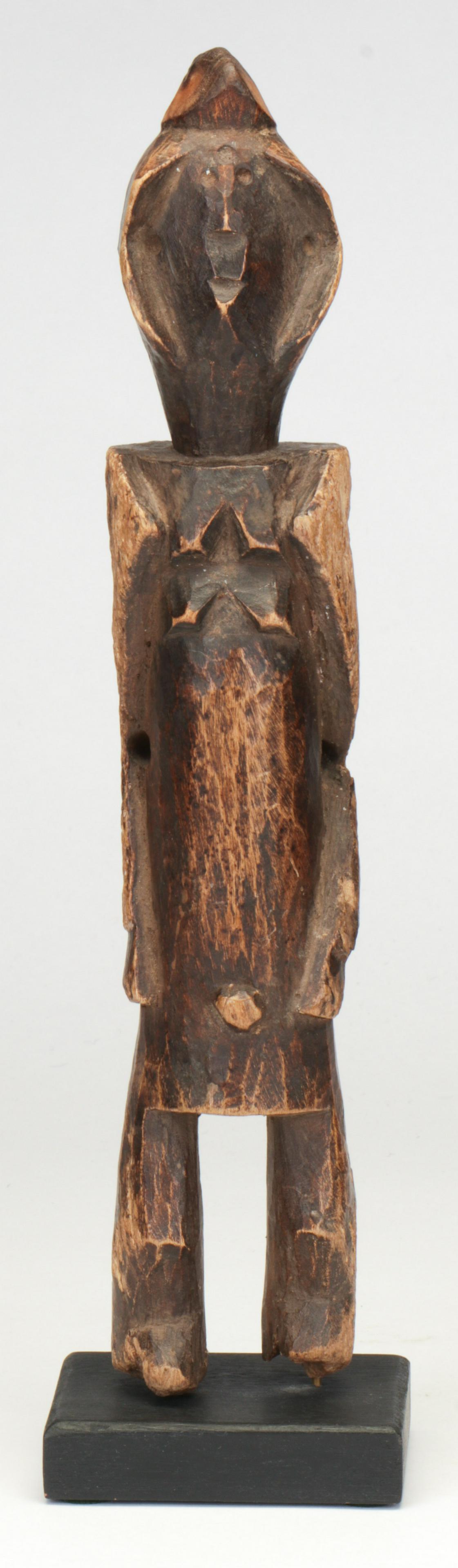 West African Old Shamba Figure, Nigeria: West African Old Shamba, Nigeria. Ex Collection of Larry Goldblatt, New York City. Size: 13'' x 2.25'' x 2'' (33 x 6 x 5 cm) Height on stand: 13.75" (35 cm). Please Note: There Are No Hidden or Confid