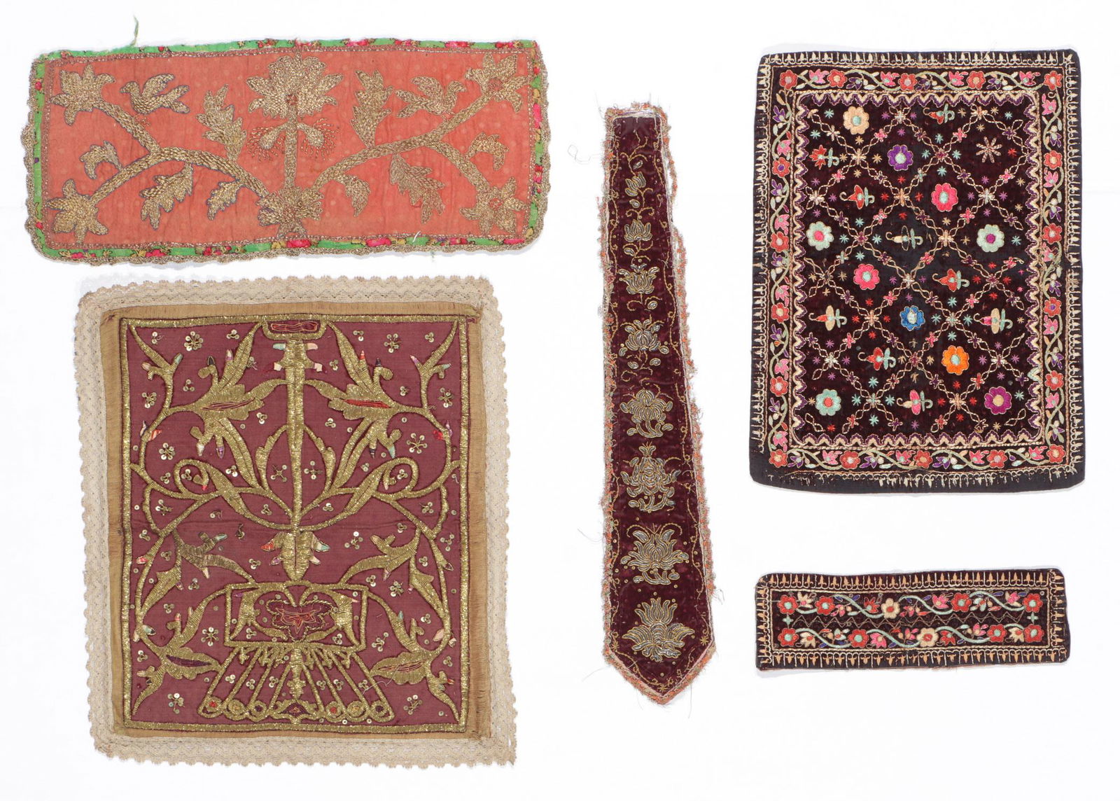Five Indonesian/Malaysian Embroidered Textiles: Five Indonesian/Malaysian embroidered textiles. Including a Chinese wedding bed banner, metallic stumpwork on velvet background, gold braiding, 19th c. Melaka, Malaysia; and 4 Sumatran embroideries wi