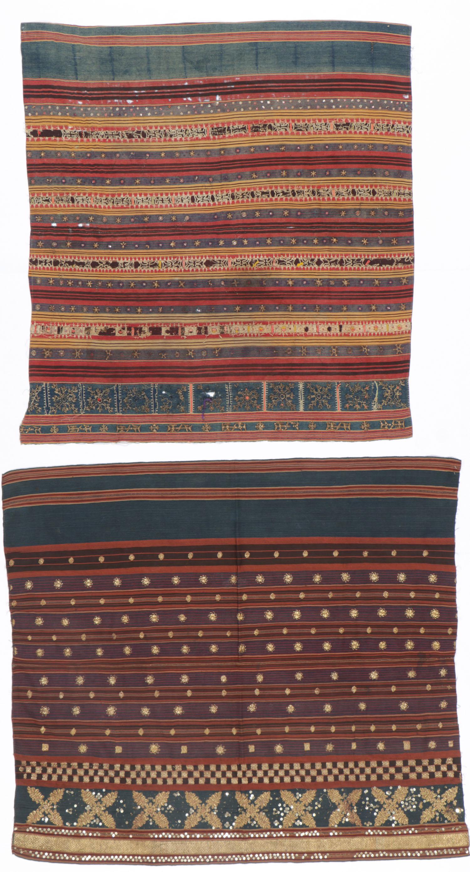 Two Antique Indonesian Ceremonial Tapis: Two Antique Indonesian Ceremonial Tapis. Tube skirts "tapis kaca," of handspun indigo-dyed cotton, mirrors, couched gilded thread, Lampung, Sumatra, early 20th c. Sizes: 1) 41'' x 44'' (104 x 112 cm);
