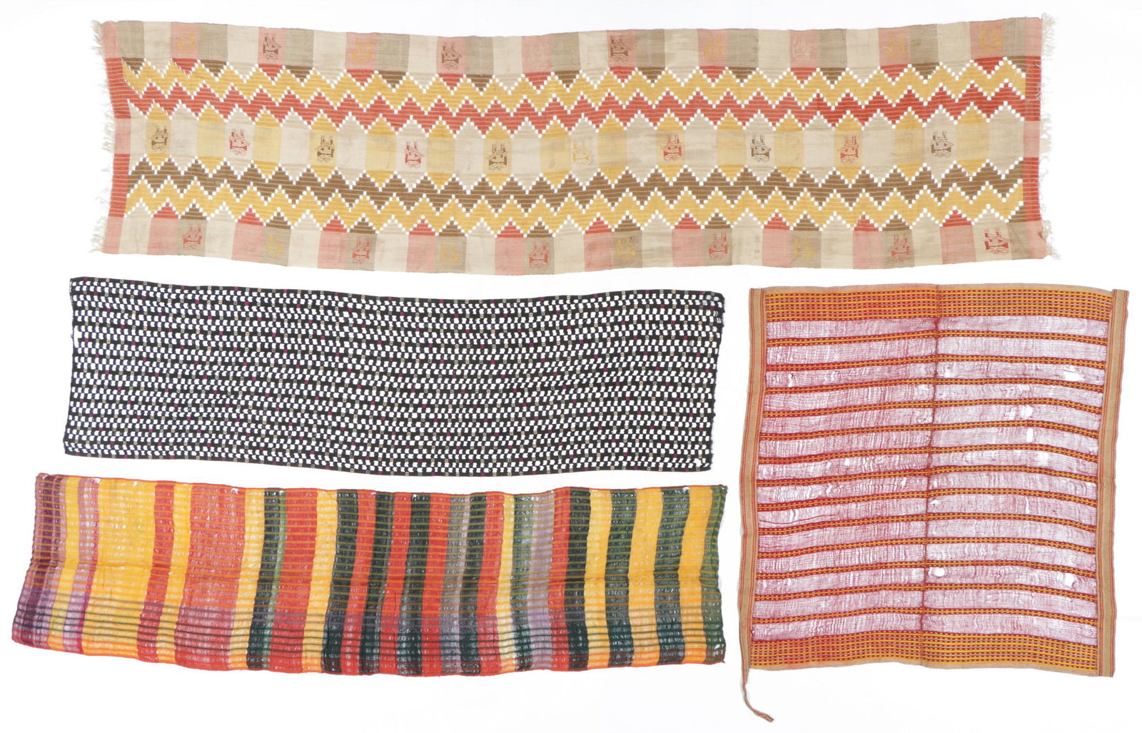 Four Old Balinese Textiles: Four Old Balinese "Tirtinnadi" Textiles: one open weave and supplementary weaving, first half 20th c; one cotton with embroidery; and a man's inner hip cloth, kamben, cotton and silk, Bali. Sizes: 1) 